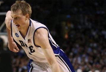 BOSTON - MARCH 26:  Kyle Singler #12 of the Duke Blue Devils drives against the Villanova Wildcats during the NCAA Men's Basketball Tournament East Regionals at TD Banknorth Garden on March 26, 2009 in Boston, Massachusetts.  (Photo by Elsa/Getty Images)