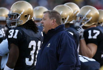 SOUTH BEND, IN - OCTOBER 17: Head coach Charlie Weis of the Notre Dame Fighting Irish gives instructions to his team during a game against the USC Trojans at Notre Dame Stadium on October 17, 2009 in South Bend, Indiana. USC defeated Notre Dame 34-27. (Photo by Jonathan Daniel/Getty Images)