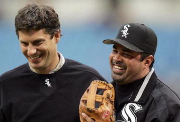 CHICAGO - MAY 12:  Manager Ozzie Guillen #13 (R) of the Chicago White Sox shares a laugh with former teammate and retired MLB player Robin Ventura after Ventura threw out the ceremonial first pitch before the game against the Baltimore Orioles on May 12, 2005 at U.S. Cellular Field in Chicago, Illinois.  (Photo by Jonathan Daniel/Getty Images)