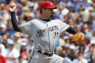 CHICAGO - JULY 03:  Jeff Suppan #37 of the Milwaukee Brewers throws a pitch against the Chicago Cubs during their MLB game on July 3, 2009 at Wrigley Field in Chicago, Illinois. (Photo by Jonathan Daniel/Getty Images) 