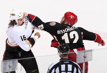 GLENDALE, AZ - OCTOBER 31:  George Parros #16 of the Anaheim Ducks fights with Paul Bissonnette #12 of the Phoenix Coyotes during the first period of the NHL game at Jobing.com Arena on October 31, 2009 in Glendale, Arizona.  (Photo by Christian Petersen/Getty Images)