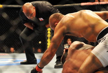 PHILADELPHIA - AUGUST 08:  (Top) Lightweight champion BJ Penn battles Kenny Florian during their lightweight championship title bout at UFC 101: Declaration at the Wachovia Center on August 8, 2009 in Philadelphia, Pennsylvania.  (Photo by Jon Kopaloff/Getty Images)