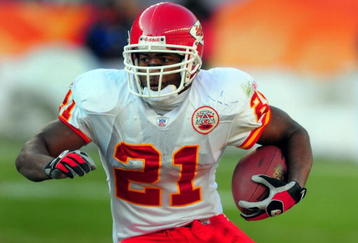 DENVER - DECEMBER 9:  Kolby Smith #21 of the Kansas City Chiefs looks for some running room in the second quarter of the football game against the Denver Broncos at Invesco Field at Mile High December 9, 2007 in Denver, Colorado.  (Photo by Steve Dykes/Getty Images)