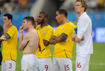 DOHA, QATAR - NOVEMBER 14: (L-R) Wayne Bridge, James Milner, Darren Bent, Tom Huddlestone and Peter Crouch of England look dejected after the International Friendly match between Brazil and England at the Khalifa Stadium on November 14, 2009 in Doha, Qatar.  (Photo by Michael Regan/Getty Images)
