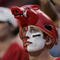FAYETTEVILLE, AR - SEPTEMBER 2:  A male fan of the Arkansas Razorbacks looks on wearing face paint and a hog hat during the game against the University of Southern California Trojans on September 2, 2006 at Donald W. Reynolds Razorback Stadium in Fayetteville, Arkansas.  Southern California won 50-14.  (Photo by Brian Bahr/Getty Images)