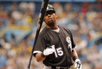 ST. PETERSBURG, FL - APRIL 19: Infielder Wilson Betemit #15 of the Chicago White Sox tosses a bat after a strikeout against the Tampa Bay Rays April 19, 2009 at Tropicana Field in St. Petersburg, Florida.  (Photo by Al Messerschmidt/Getty Images)