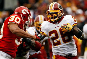 LANDOVER, MD - OCTOBER 18:  Mike Brown #30 of the Kansas City Chiefs tackles Clinton Portis #26 of the Washington Redskins during their game October 18, 2009 at FedEx Field in Landover, Maryland.The Chiefs won the game 14-6.  (Photo by Win McNamee/Getty Images)