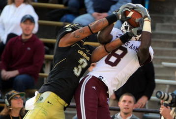 BOULDER, CO - NOVEMBER 07:  Wide receiver Jeff Fuller #8 of the Texas A&M Aggies makes a reception against the defense of Jimmy Smith #3 of the Colorado Buffaloes during NCAA college football action at Folsom Field on November 7, 2009 in Boulder, Colorado. Colorado defeated Texas A&M 35-34.  (Photo by Doug Pensinger/Getty Images)