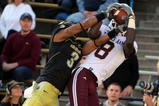 BOULDER, CO - NOVEMBER 07:  Wide receiver Jeff Fuller #8 of the Texas A&M Aggies makes a reception against the defense of Jimmy Smith #3 of the Colorado Buffaloes during NCAA college football action at Folsom Field on November 7, 2009 in Boulder, Colorado. Colorado defeated Texas A&M 35-34.  (Photo by Doug Pensinger/Getty Images)