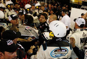 CONCORD, NC - MAY 24:  Crew members of both Brad Keselowski, driver of the #88 NAVY Chevrolet, and Denny Hamlin, driver of the #20 Z-Line Designs Toyota, argue on pit road after an altercation following the NASCAR Nationwide Series CARQUEST Auto Parts 300 on May 24, 2008 at Lowe's Motor Speedway in Concord, North Carolina.  (Photo by Jason Smith/Getty Images for NASCAR)