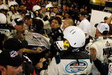 CONCORD, NC - MAY 24:  Crew members of both Brad Keselowski, driver of the #88 NAVY Chevrolet, and Denny Hamlin, driver of the #20 Z-Line Designs Toyota, argue on pit road after an altercation following the NASCAR Nationwide Series CARQUEST Auto Parts 300 on May 24, 2008 at Lowe's Motor Speedway in Concord, North Carolina.  (Photo by Jason Smith/Getty Images for NASCAR)