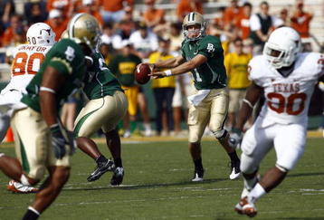 WACO, TX - NOVEMBER 14:  Quarterback Nick Florence #11 of the Baylor Bears drops back to pass during the first half against the Texas Longhorns on November 14, 2009 at Floyd Casey Stadium in Waco, Texas.  The Longhorns beat the Bears 47-14.  (Photo by Tom Pennington/Getty Images)