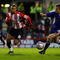 LONDON, ENGLAND - NOVEMBER 14:  John Bostock of Brentford battles for the ball with Tony Craig of Millwall during the Coca-Cola League One match between Brentford and Millwall at Griffin Park on November 14, 2009 in London, England.  (Photo by Dean Mouhtaropoulos/Getty Images)