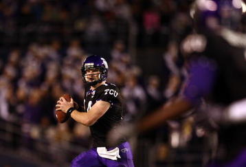 SAN DIEGO, CA - DECEMBER 23:  Quarterback Andy Dalton #14 of  TCU throws the ball against Boise State during the San Diego County Credit Union Poinsettia Bowl at Qualcomm Stadium on December 23, 2008 in San Diego, California. (Photo by Donald Miralle/Getty Images)