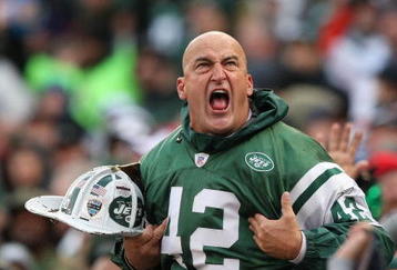 EAST RUTHERFORD, NJ - OCTOBER 18:  New York Jets fan fireman Ed Anzalone cheers during the game between The New York Jets against The Buffalo Bills on October 18, 2009 at Giants Stadium in East Rutherford, New Jersey.  (Photo by Al Bello/Getty Images)