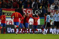 MADRID, SPAIN - NOVEMBER 14: Xabi Alonso of Spain celebrates after scoring the first goal with David Villa during the friendly International football match Spain against Argentina at the Vicente Calderon stadium in Madrid, on November 14, 2009 in Madrid, Spain.  (Photo by Clive Brunskill/Getty Images)