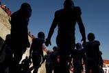 LOS ANGELES, CA - NOVEMBER 14:  The Stanford Cardinal walks out of the tunnel to take the field for the game with the USC Trojans on November 14, 2009 at the Los Angeles Coliseum in Los Angeles, California.  Stanford won 55-21.  (Photo by Stephen Dunn/Getty Images)