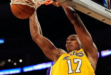 LOS ANGELES, CA - OCTOBER 30:  Andrew Bynum #17 of the Los Angeles Lakers dunks against Dallas Mavericks during the NBA basketball game at Staples Center on October 30, 2009 in Los Angeles, California.  NOTE TO USER: User expressly acknowledges and agrees that, by downloading and/or using this Photograph, user is consenting to the terms and conditions of the Getty Images License Agreement.  (Photo by Kevork Djansezian/Getty Images)