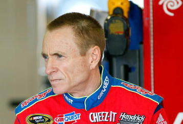 FORT WORTH, TX - NOVEMBER 07:  Mark Martin, driver of the #5 CARQUEST/Kellogg's Chevrolet, sits in the garage during practice for the NASCAR Sprint Cup Series Dickies 500 at Texas Motor Speedway on November 7, 2009 in Fort Worth, Texas.  (Photo by Geoff Burke/Getty Images for NASCAR)