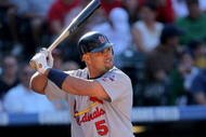 DENVER - SEPTEMBER 27:  Albert Pujols #5 of the St. Louis Cardinals takes an at bat against the Colorado Rockies at Coors Field on September 27, 2009 in Denver, Colorado. The Rockies defeated the Cardinals 4-3.  (Photo by Doug Pensinger/Getty Images)