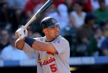 DENVER - SEPTEMBER 27:  Albert Pujols #5 of the St. Louis Cardinals takes an at bat against the Colorado Rockies at Coors Field on September 27, 2009 in Denver, Colorado. The Rockies defeated the Cardinals 4-3.  (Photo by Doug Pensinger/Getty Images)