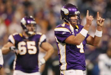 MINNEAPOLIS - NOVEMBER 15:  Quarterback Brett Favre #4 of the Minnesota Vikings shows the bench how far away they Vikings are from a first down in the second quarter against the Detroit Lions on November 15, 2009 at Hubert H. Humphrey Metrodome in Minneapoils, Minnesota.  (Photo by Elsa/Getty Images)