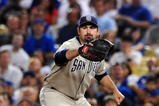 LOS ANGELES, CA - SEPTEMBER 04:  Adrian Gonzalez #23 of the San Diego Padres catches a ball at first against the Los Angeles Dodgers on September 4, 2009 at Dodger Stadium in Los Angeles, California. (Photo by Jacob de Golish/Getty Images)