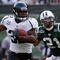 EAST RUTHERFORD, NJ - NOVEMBER 15:  Maurice Jones-Drew #32 of the Jacksonville Jaguars runs the ball past Dwight Lowery #21 of the New York Jets for a first quarter touchdown on November 15, 2009 at Giants Stadium in East Rutherford, New Jersey.  (Photo by Jim McIsaac/Getty Images)
