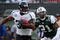 EAST RUTHERFORD, NJ - NOVEMBER 15:  Maurice Jones-Drew #32 of the Jacksonville Jaguars runs the ball past Dwight Lowery #21 of the New York Jets for a first quarter touchdown on November 15, 2009 at Giants Stadium in East Rutherford, New Jersey.  (Photo by Jim McIsaac/Getty Images)