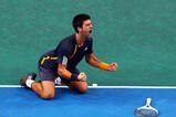 PARIS - NOVEMBER 15:  Novak Djokovic of Serbia celebrates match point in the Final match against Gael Monfils of France during the ATP Masters Series at the Palais Omnisports De Paris-Bercy on November 15, 2009 in Paris, France.  (Photo by Clive Rose/Getty Images)