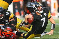 PITTSBURGH - NOVEMBER 15: Ben Roethlisberger #7 of the Pittsburgh Steelers is sacked by Jonathan Fanene #68 of the Cincinnati Bengals at Heinz Field on November 15, 2009 in Pittsburgh, Pennsylvania.  (Photo by Rick Stewart/Getty Images)