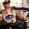 AVONDALE, AZ - NOVEMBER 15:  Jimmie Johnson, driver of the #48 Lowe's Chevrolet, celebrates in victory lane after winning the NASCAR Sprint Cup Series Checker O'Reilly Auto Parts 500 at Phoenix International Raceway on November 15, 2009 in Avondale, Arizona.  (Photo by Jason Smith/Getty Images for NASCAR)