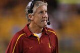 TEMPE, AZ - NOVEMBER 7:  Head coach Pete Carroll of the USC Trojans watches the replay on the videoboard against the Arizona State Sun Devils on November 7, 2009 at Sun Devil Stadium in Tempe, Arizona.  USC won 14-9.  (Photo by Jeff Golden/Getty Images)
