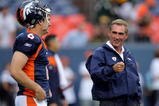 DENVER - AUGUST 22:  Head coach Mike Shanahan (R) of the Denver Broncos chats with quarterback Jay Cutler #6 during warm ups prior to facing the Green Bay Packers during NFL preseason action at Invesco Field on August 22, 2008 in Denver, Colorado.  (Photo by Doug Pensinger/Getty Images)