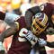 LANDOVER, MD - NOVEMBER 15:  Andre Carter #99 of the Washington Redskins celebrates a sack against the Denver Broncos at FedExField on November 15, 2009 in Landover, Maryland. The Redskins defeated the Broncos 27-17. (Photo by Larry French/Getty Images)