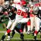 OAKLAND, CA - NOVEMBER 15:  Jamaal Charles #25 of the Kansas City Chiefs breaks through on his way to scoring a touchdown against the Oakland Raiders at Oakland-Alameda County Coliseum on November 15, 2009 in Oakland, California.  (Photo by Ezra Shaw/Getty Images)