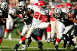 OAKLAND, CA - NOVEMBER 15:  Jamaal Charles #25 of the Kansas City Chiefs breaks through on his way to scoring a touchdown against the Oakland Raiders at Oakland-Alameda County Coliseum on November 15, 2009 in Oakland, California.  (Photo by Ezra Shaw/Getty Images)