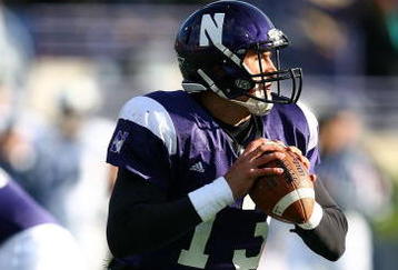 EVANSTON, IL - OCTOBER 31: Mike Kafka #13 of the Northwestern Wildcats looks for a receiver against the Penn State Nittany Lions at Ryan Field on October 31, 2009 in Evanston, Illinois. Penn State defeated Northwestern 34-13. (Photo by Jonathan Daniel/Getty Images)