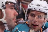 GLENDALE, AZ - SEPTEMBER 26:  Dany Heatley #15 of the San Jose Sharks talks with Patrick Marleau #12 on the bench during the preseason NHL game against the Phoenix Coyotes at Jobing.com Arena on September 26, 2009 in Glendale, Arizona.  The Coyotes defeated the Sharks 2-0.  (Photo by Christian Petersen/Getty Images)