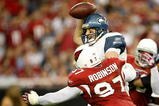 GLENDALE, AZ - NOVEMBER 15:  Quarterback Matt Hasselbeck #8 of the Seattle Seahawks is sacked by Bryan Robinson #97 of the Arizona Cardinals in the second half at University of Phoenix Stadium on November 15, 2009 in Glendale, Arizona. The Cardinals defeated the Seahawks 31-20.  (Photo by Jeff Gross/Getty Images)