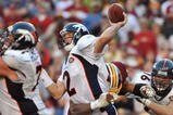 LANDOVER, MD - NOVEMBER 15:  Chris Simms #2 of the Denver Broncos passes under pressure during the game against the Washington Redskins at FedExField on November 15, 2009 in Landover, Maryland. The Redskins defeated the Broncos 27-17. (Photo by Larry French/Getty Images)