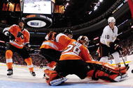 PHILADELPHIA - OCTOBER 10: Goaltender Ray Emery #29 of the Philadelphia Flyers makes the kick save on Corey Perry #10 of the Anaheim Ducks as Chris Pronger #20 looks on at the Wachovia Center on October 10, 2009 in Philadelphia, Pennsylvania.  (Photo by Bruce Bennett/Getty Images)