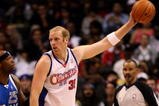 LOS ANGELES, CA - OCTOBER 31:  Chris Kaman #35 of the Los Angeles Clippers controls the ball against Erick Dampier #25 of the Dallas Mavericks on October 31, 2009 at Staples Center in Los Angeles, California. Dallas won 93-84.   NOTE TO USER: User expressly acknowledges and agrees that, by downloading and/or using this Photograph, user is consenting to the terms and conditions of the Getty Images License Agreement.  (Photo by Stephen Dunn/Getty Images)