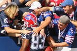 ORCHARD PARK, NY - SEPTEMBER 20:  Wide receiver Lee Evans #83 of the Buffalo Bills celebrates with the fans after scoring a touchdown during the first quarter against the Tampa Bay Buccaneers at Ralph Wilson Stadium on September 20, 2009 in Orchard Park, New York.  The Bills won 33-20.  (Photo by Rick Stewart/Getty Images)