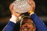 MIAMI - JANUARY 08:  Head coach Urban Meyer of the Florida Gators celebrates with the National Championship trophy after their 24-14 win against the Oklahoma Sooners during the FedEx BCS National Championship game at Dolphin Stadium on January 8, 2009 in Miami, Florida.  (Photo by Marc Serota/Getty Images)