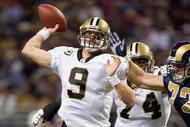 ST. LOUIS - NOVEMBER 15: Drew Brees #9 of the New Orleans Saints passes against the St. Louis Rams at the Edward Jones Dome on November 15, 2009 in St. Louis, Missouri.  (Photo by Dilip Vishwanat/Getty Images)