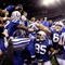 INDIANAPOLIS - NOVEMBER 15:  Reggie Wayne #87 of the Indianapolis Colts celebrates his touchdown with teammates and fans in the fourth quarter of the game against the New England Patriots at Lucas Oil Stadium on November 15, 2009 in Indianapolis, Indiana.  (Photo by Jamie Squire/Getty Images)
