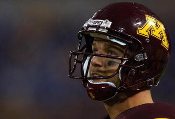 MINNEAPOLIS - SEPTEMBER 13:  Quarterback Adam Weber #8 of the Minnesota Golden Gophers looks on from the sideline against the Montana State Bobcats at the Metrodome on September 13, 2008 in Minneapolis, Minnesota. Minnesota defeated Montana State 35-23.  (Photo by Jeff Gross/Getty Images)