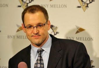 PITTSBURGH - MARCH 25:  Head coach Dan Bylsma of the PIttsburgh Penguins addresses the media after the Penguins defeated the Calgary Flames 2-0 on March 25, 2009 at Mellon Arena in Pittsburgh, Pennsylvania.  (Photo by Jamie Sabau/Getty Images)