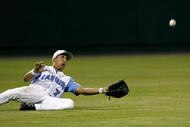 OMAHA, NE - JUNE 24:  Leftfielder Reid Fronk #7 of the North Carolina Tar Heels attempts to make a sliding catch in the outfield during their 9-3 loss to the Oregon State Beavers in Game 2 of the NCAA College World Series Championship at Rosenblatt Stadium on June 24, 2007 in Omaha, Nebraska. (Photo by Kevin C. Cox/Getty Images)